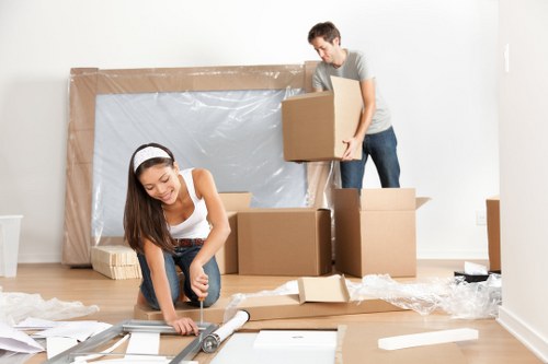 Professional removal van loading furniture in Sutton