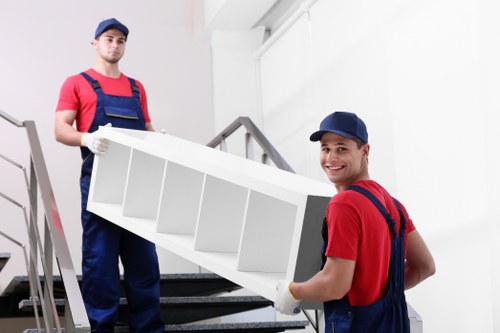 Man and van team preparing equipment safely before a move