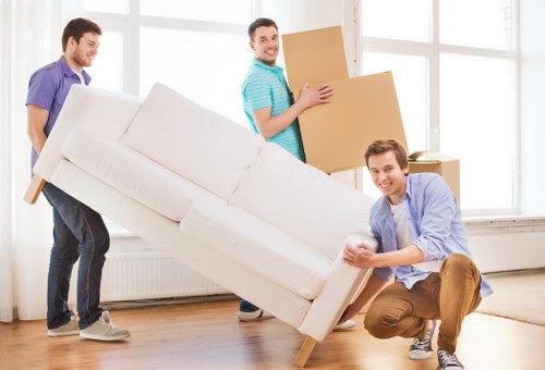Professional team loading furniture for a house move in Sutton