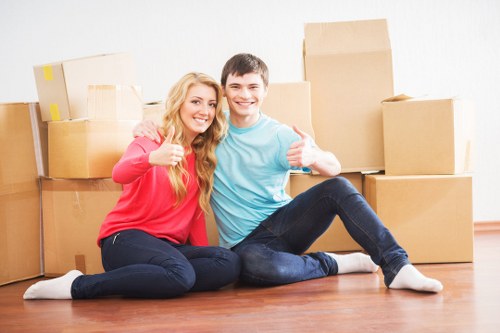 Local movers loading items for a Sutton property move