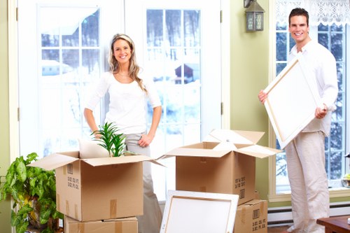 Packed household boxes ready for a short-notice removal in Sutton